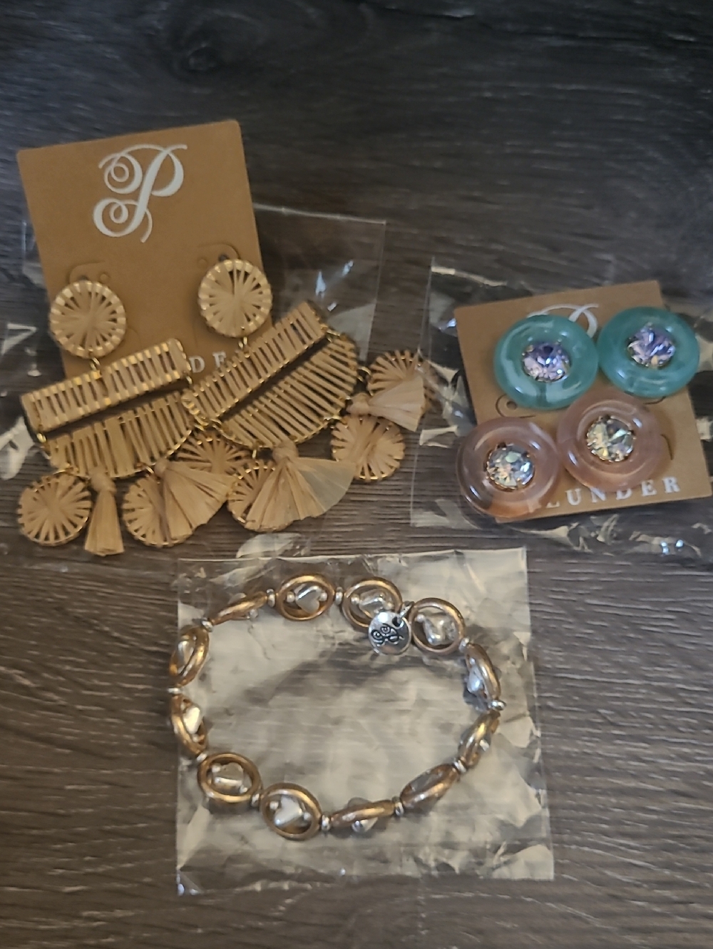 Plunder Two Pairs Of Earrings and A Bracelet